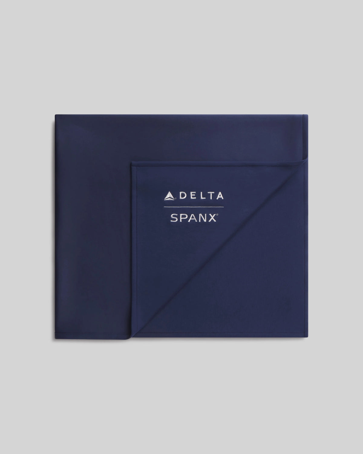 Delta x SPANX AirEssentials® Blanket